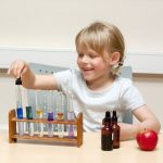 child with test tubes