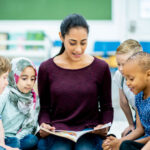 woman reading to children