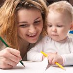 mom coloring with child